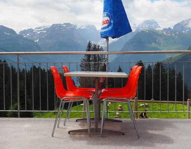 Swiss Restaurant with Orange Chairs