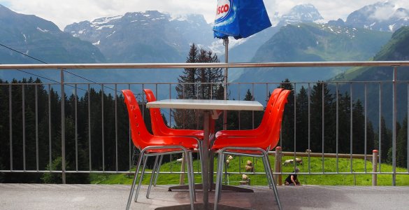 Swiss Restaurant with Orange Chairs
