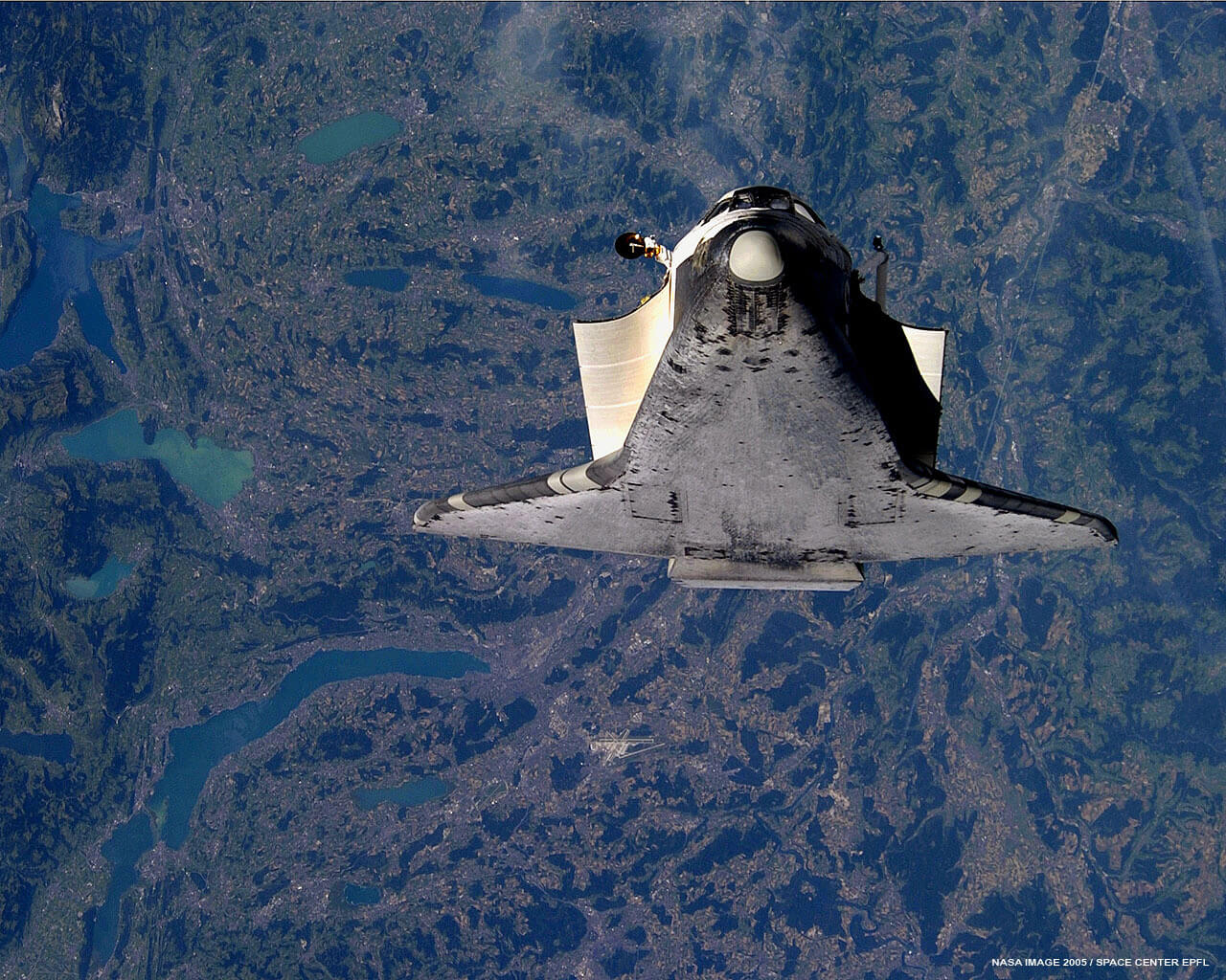 Space Shuttle Discovery above Switzerland in 2005