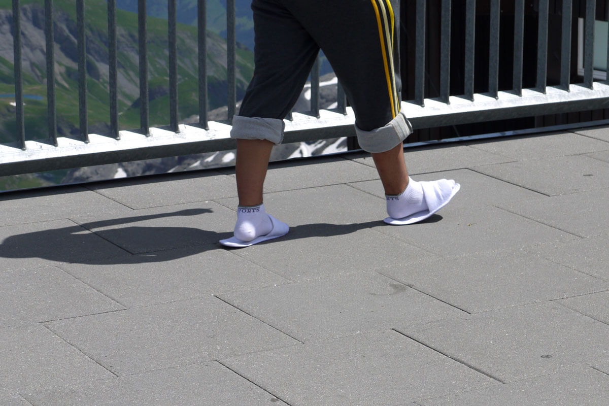 Man wearing slippers on Schilthorn