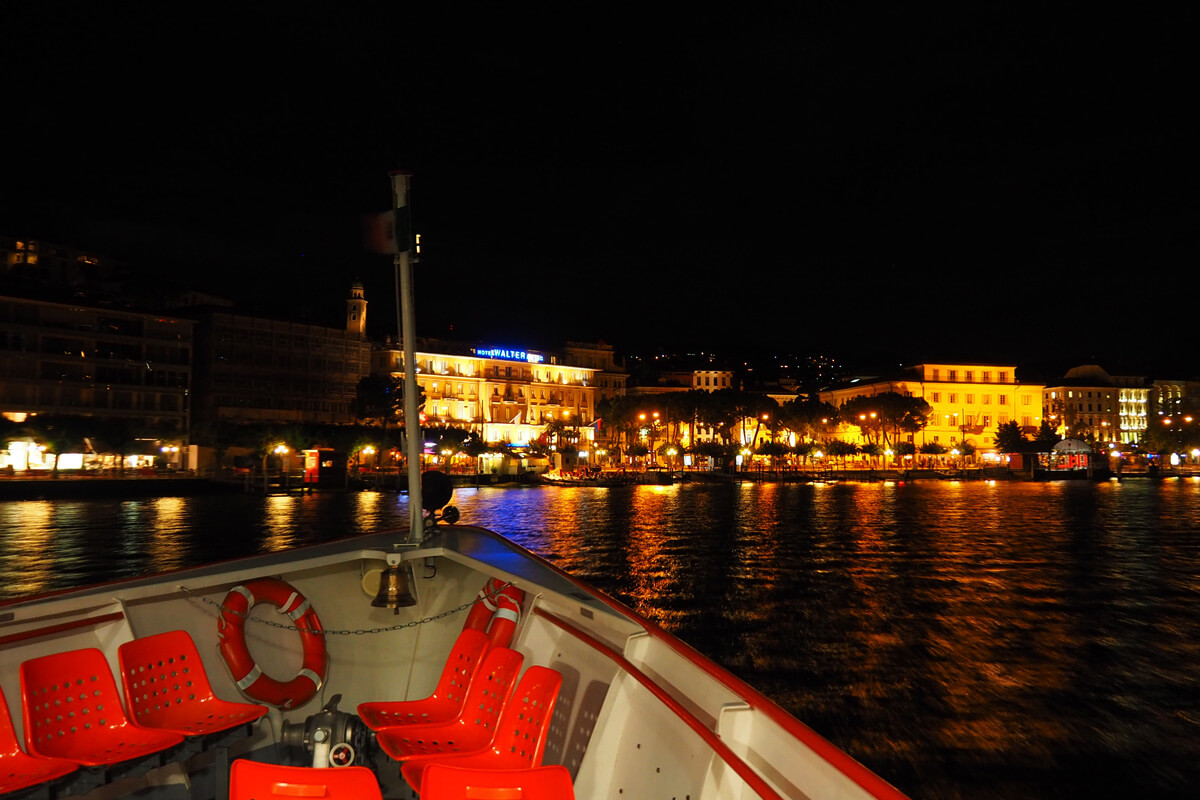 Lugano by night from a boat