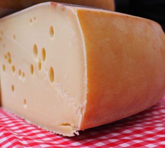 Why Does Swiss Cheese Have Holes? Emmentaler AOP URTYP Cheese