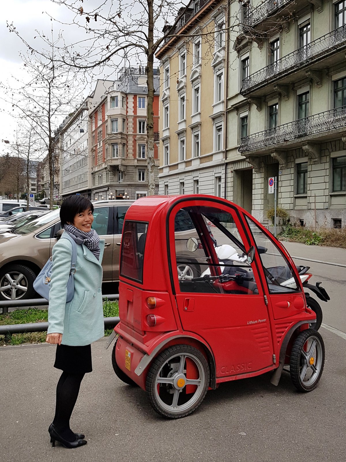 A tiny car parked in Switzerland