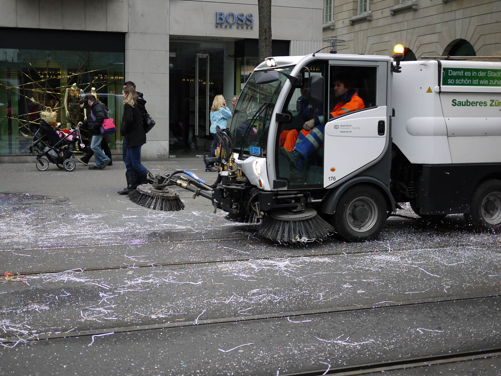 Cleaning crew on Bahnhofstrasse after the Zürich Carnival parade