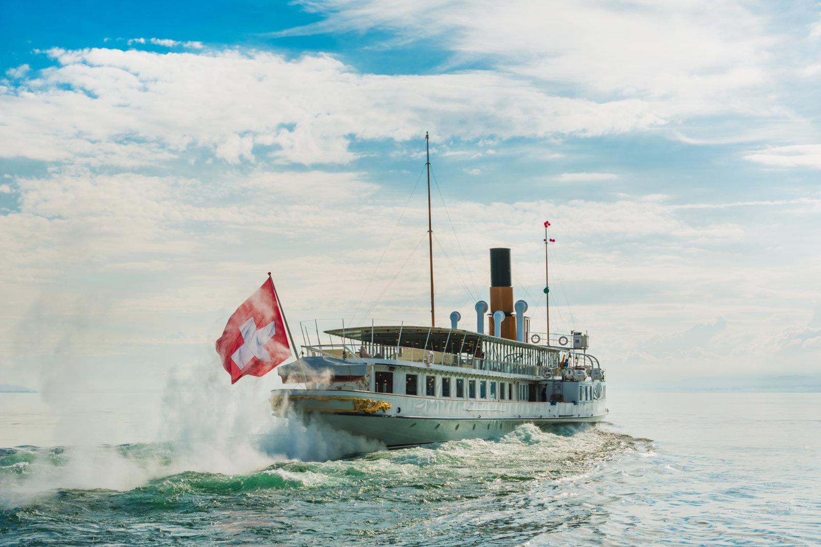 Benefits of the Swiss Travel Pass include Lake Geneva Steamboat Rides