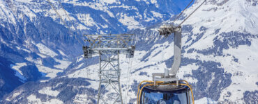 Mount Titlis Cable Car Guide - Rotair Cable Car Cabin in snowcovered Swiss Alps