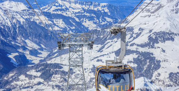 Mount Titlis Cable Car Guide - Rotair Cable Car Cabin in snowcovered Swiss Alps