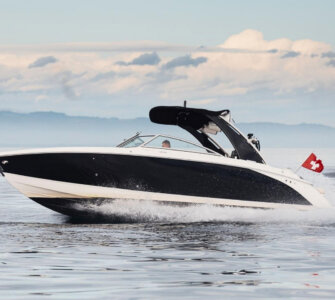 Genevaboats - Motor Boat speeding across Lake Geneva