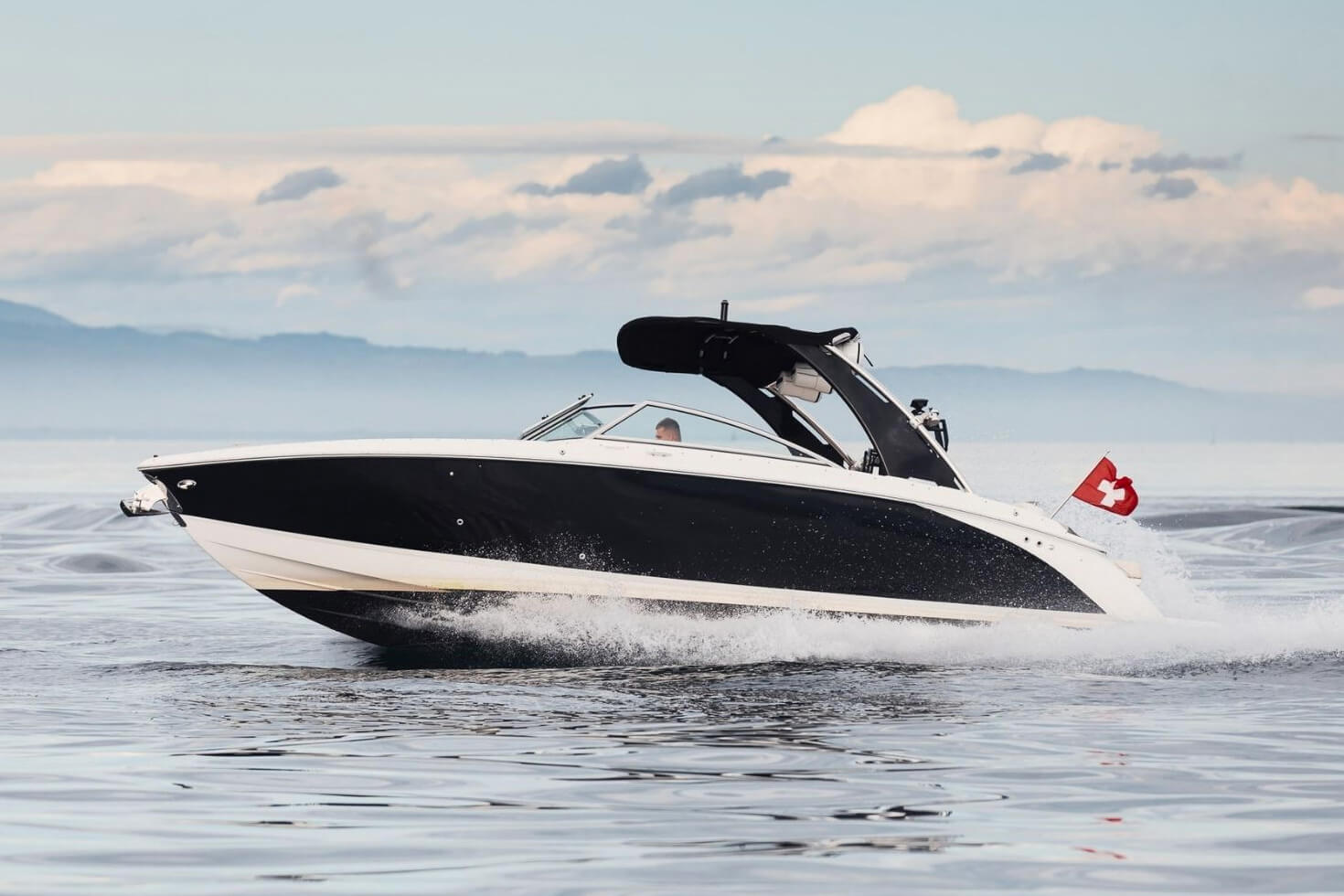 Genevaboats - Motor Boat speeding across Lake Geneva